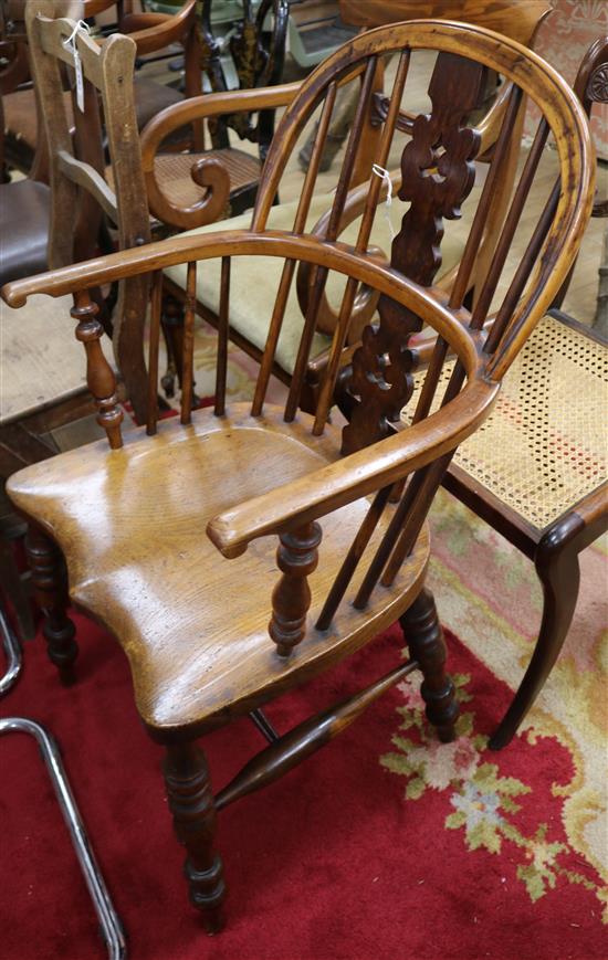 A Victorian yew and elm Windsor elbow chair